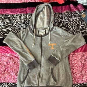 Grey zip up, thin material and fits like a medium